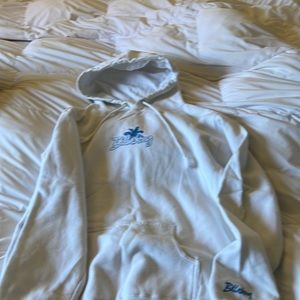A billabong white with blue logo hoodie from the early 2000’s